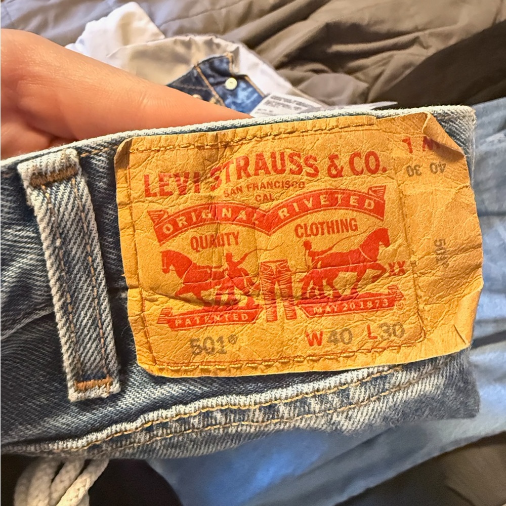 Levi's Men’s Light Blue Straight Jeans with Tan Leather Patch